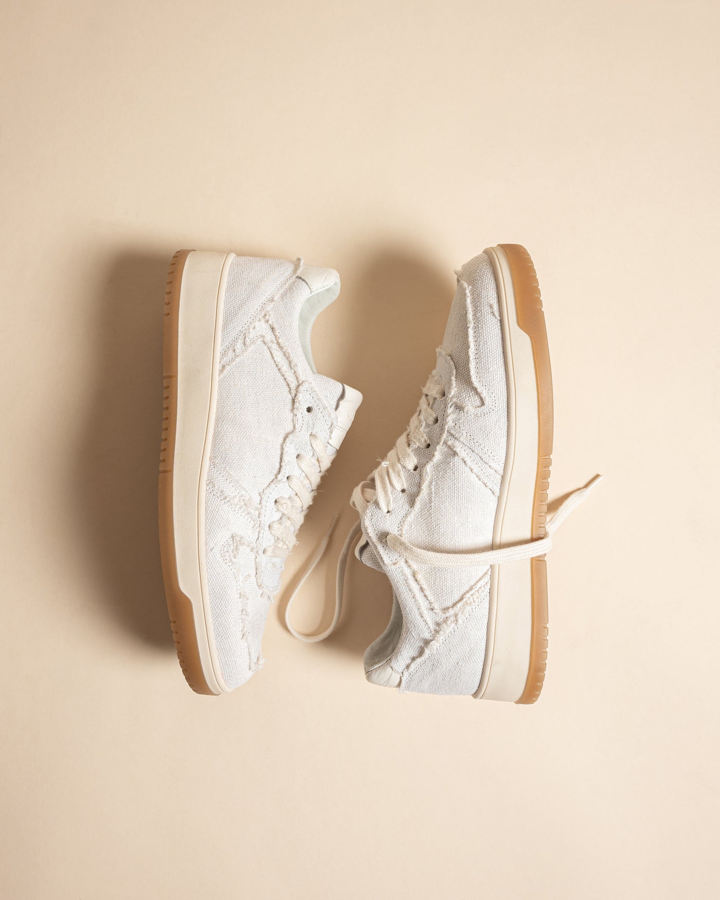 Delta | White Canvas Sneakers